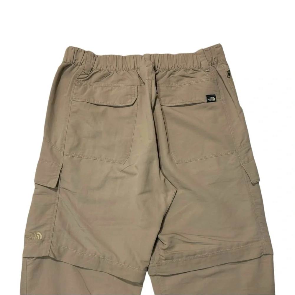 The North Face convertible cargo‎ hiking pants in a beige or tan color Men’s - M